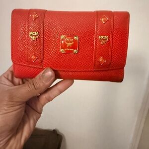 MCM Red Textured Leather Trifold Wallet with Gold Hardware
